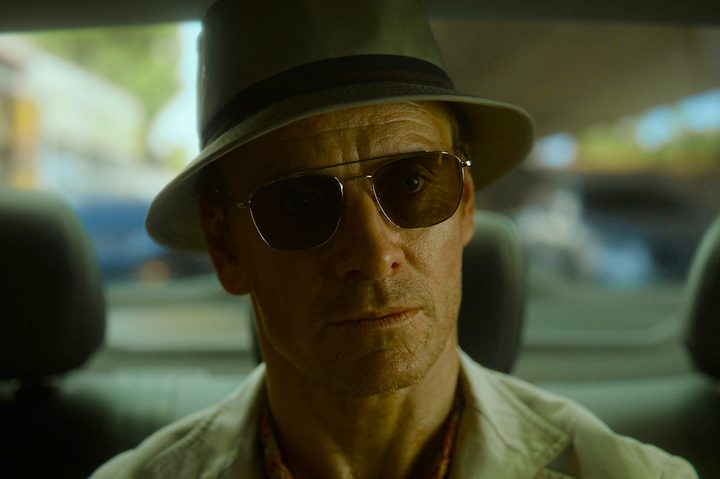 Michael Fassbender wears a bucket hat in The Killer.