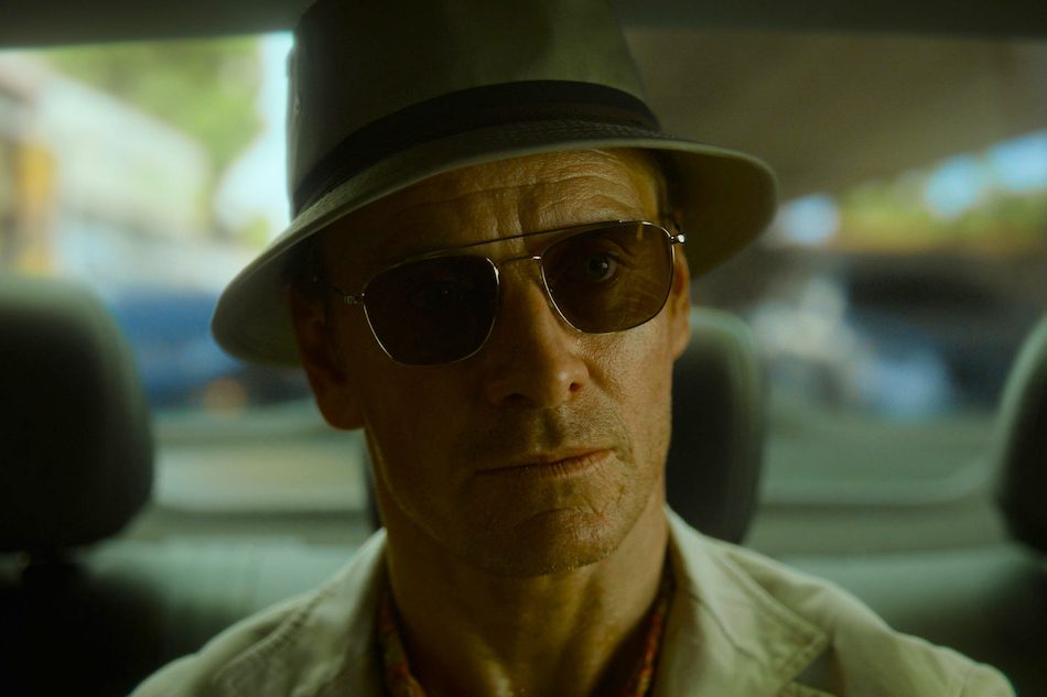 Michael Fassbender wears a bucket hat in The Killer.
