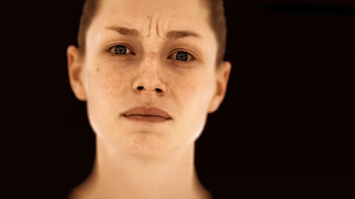 A woman's face looking concerned.
