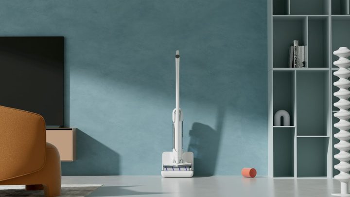 The Narwal Floor Washer placed in its dock against a wall.