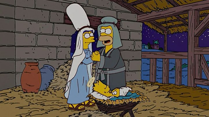 Marge, Homer, and Bart recreate the Nativity on The Simpsons.