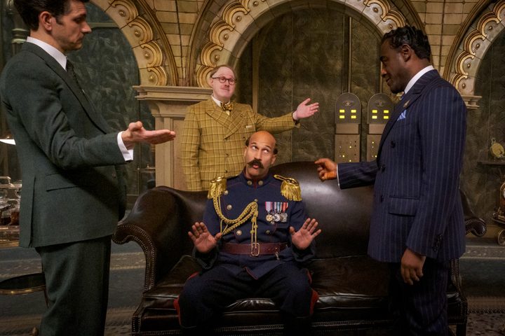 The heads of the Chocolate Cartel all point at Keegan-Michael Key in Wonka.