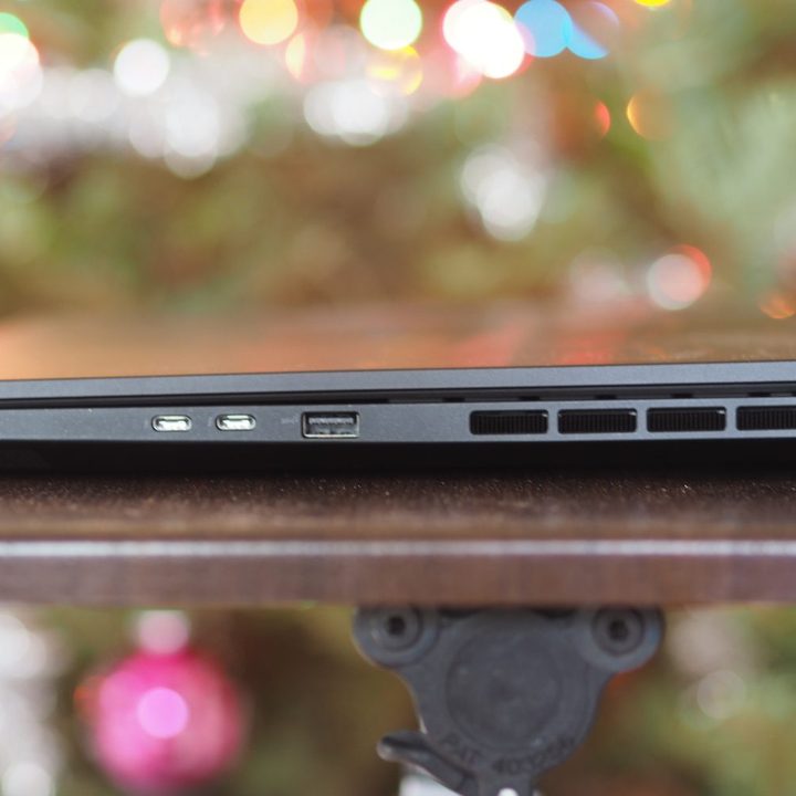 Asus ProArt Studiobook 16 OLED left side view showing ports and vents.
