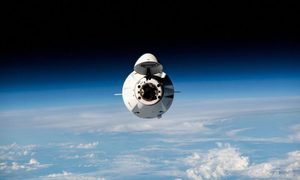 The SpaceX Dragon cargo spacecraft is pictured approaching the space station above the Indian Ocean on March 16, 2023.