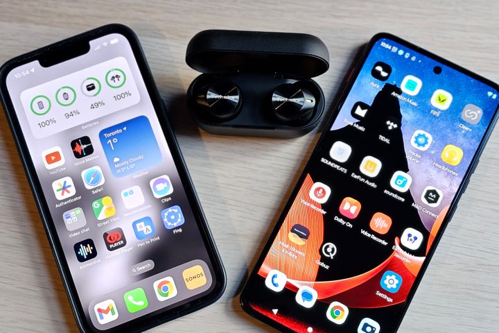 A pair of Technics wireless earbuds seen between an iPhone 14 and a Motorola ThinkPhone as an example of Bluetooth Multipoint.