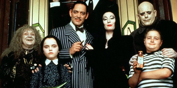 A family poses in The Addams Family.