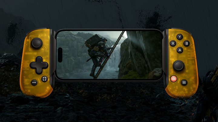 Sam Porter Bridges climbs a ladder in Death Stranding for iOS played on a limited edition Death Stranding Backbone One.