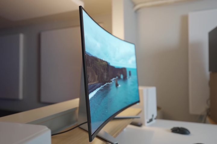 The curve of the Alienware 32 QD-OLED on a desk.