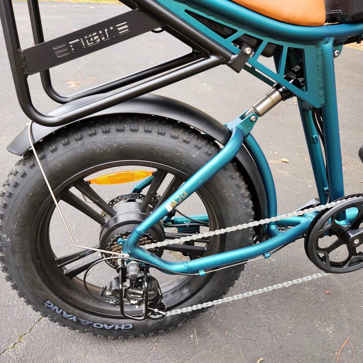 Engwe M20 e-bike rear suspension shock and lower section of installed optional rear rack.