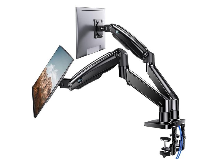 The Huanuo Dual Monitor Stand holding two monitors.