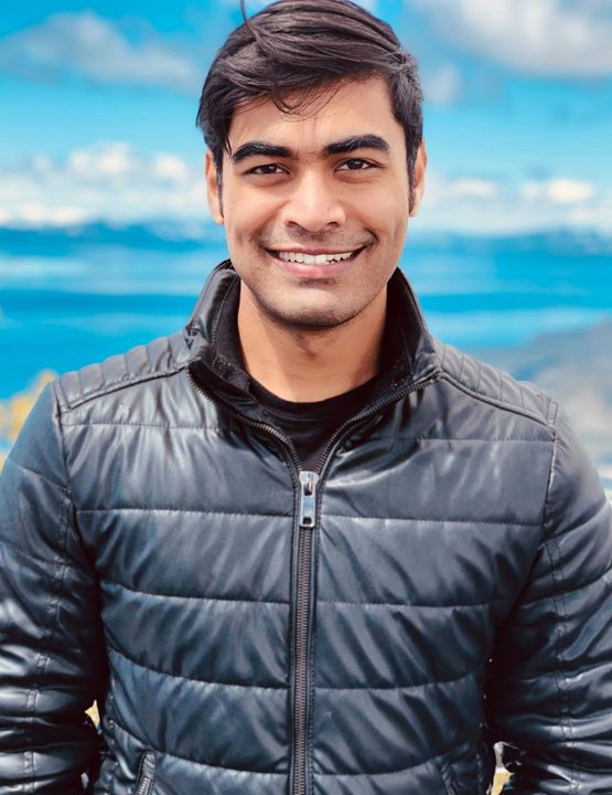 Convai founder Purnendu Mukherjee stands against a skyline.