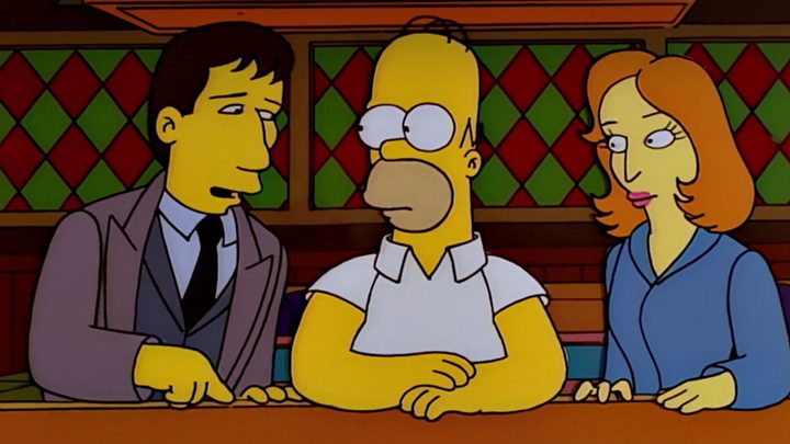 Mulder and Scully shadow Homer Simpson in The Simpsons.