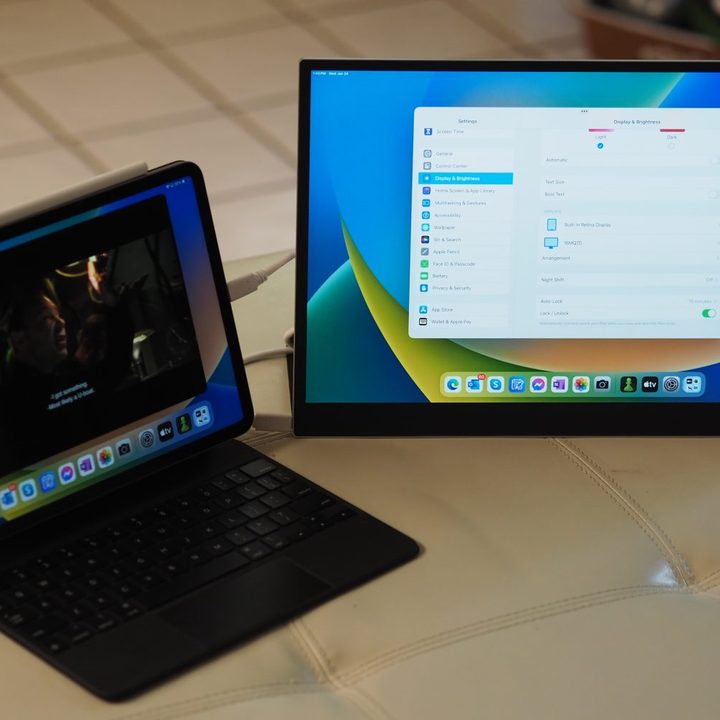 Apple iPad Pro 11 with Magic Keyboard, Apple Pencil, and external display.