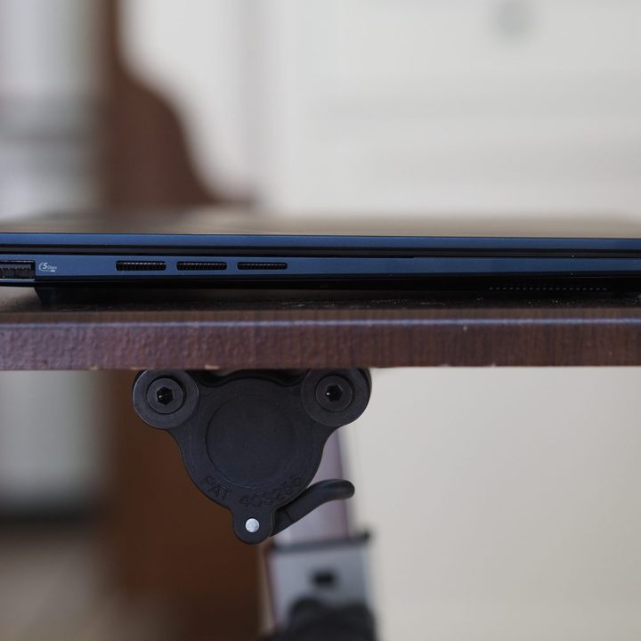 Asus Zenbook 14 OLED 2024 left side view showing vents and ports.