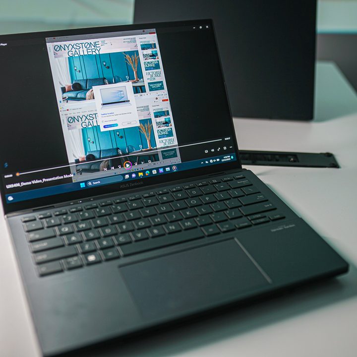 The Zenbook Duo in laptop mode on a table.