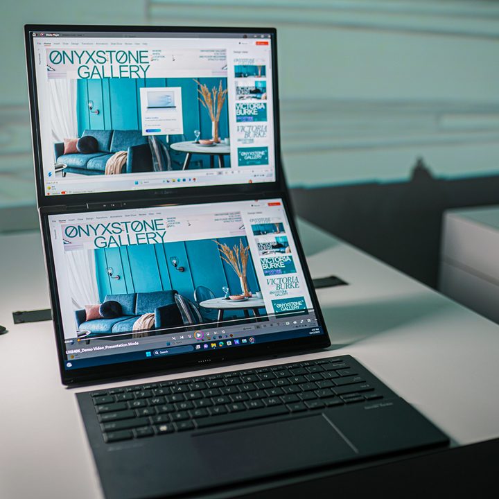 The two screens of the Asus Zenbook Duo on a white table.