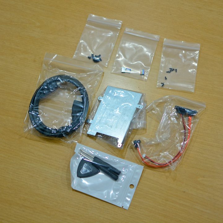 All the bundled accessories included with the Ayaneo Retro Mini PC AM01.