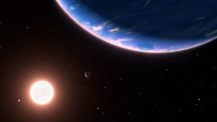 This is an artist’s conception of the exoplanet GJ 9827d, the smallest exoplanet where water vapour has been detected in its atmosphere. The planet could be an example of potential planets with water-rich atmospheres elsewhere in our galaxy. It is a rocky world, only about twice Earth’s diameter. It orbits the red dwarf star GJ 9827. Two inner planets in the system are on the left. The background stars are plotted as they would be seen to the unaided eye looking back toward our Sun, which itself is too faint to be seen. The blue star at upper right is Regulus, the yellow star at bottom centre is Denebola, and the blue star at bottom right is Spica. The constellation Leo is on the left, and Virgo is on the right. Both constellations are distorted from our Earth-bound view from 97 light-years away.