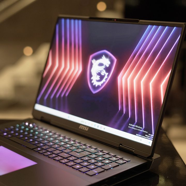 The MSI Titan 18 HX in a dark room.