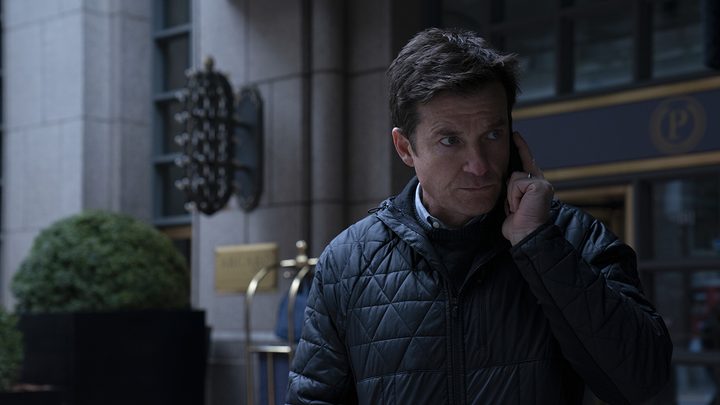 Marty Byrde on the phone outside in a scene from Ozark.
