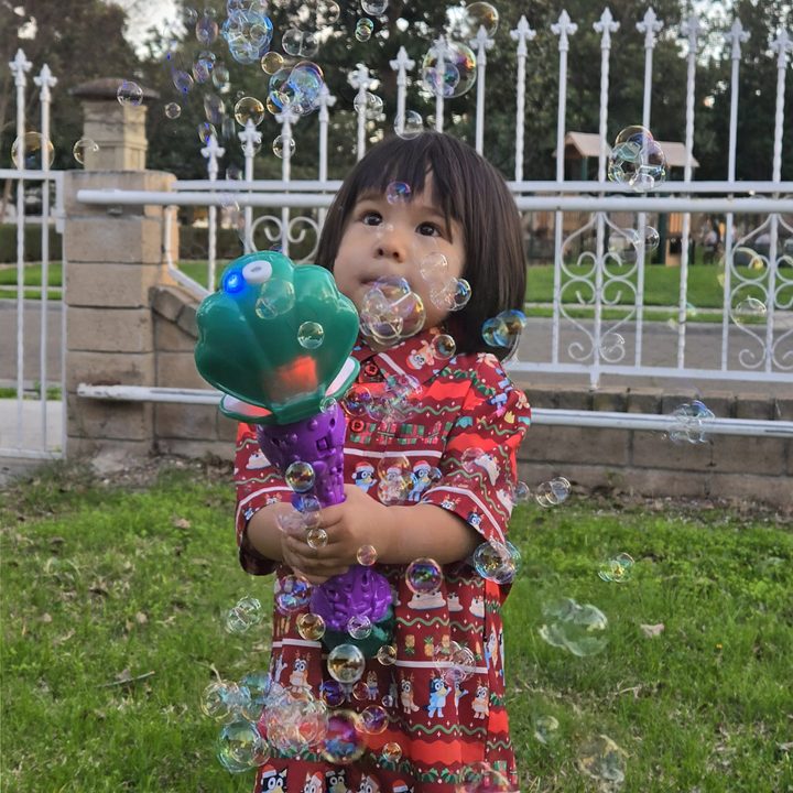 Toddler playing with bubbles taken with Samsung Galaxy S24.