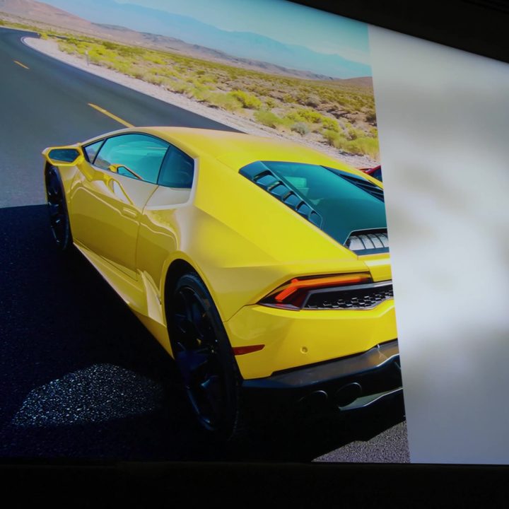 A prototype Sony television with half the screen as normal, and half the screen showing a representation of how the new backlight system works.
