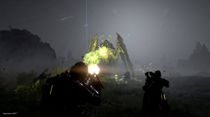 A soldier fighting a bile spewer in Helldivers 2.