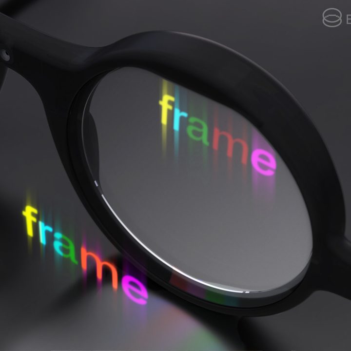 A close-up of Brilliant Labs Frame smart glasses with a simulated image on the display.