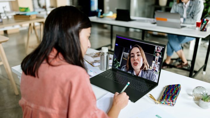 A woman using the Acer Swift Edge 16 laptop.