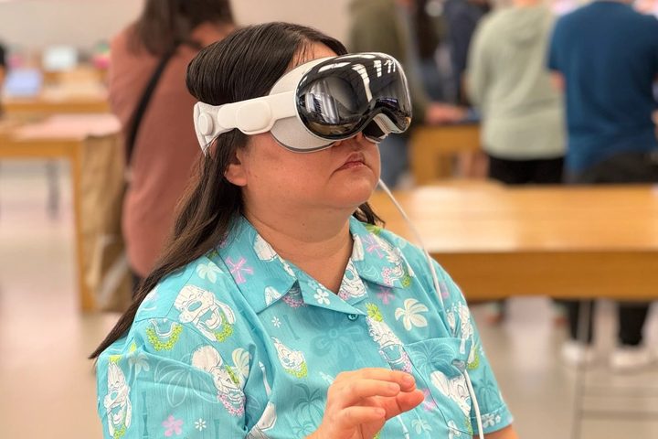 A person wearing the Apple Vision Pro demo unit in an Apple Store.