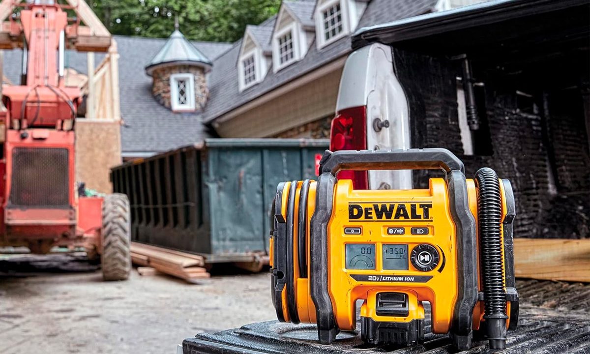 The DeWalt 20V Max portable tire inflator at a construction site.