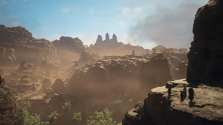 Characters look out over a canyon in Dragon's Dogma 2.