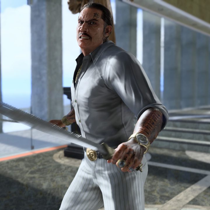 Dwight Mendez brandishing a machete in a well lit penthouse suite.