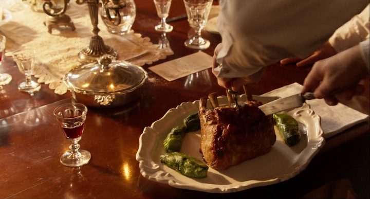 A rack of lamb is served in The Taste of Things.