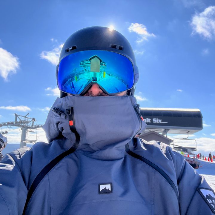 The author, enjoying a bluebird day on the slopes.