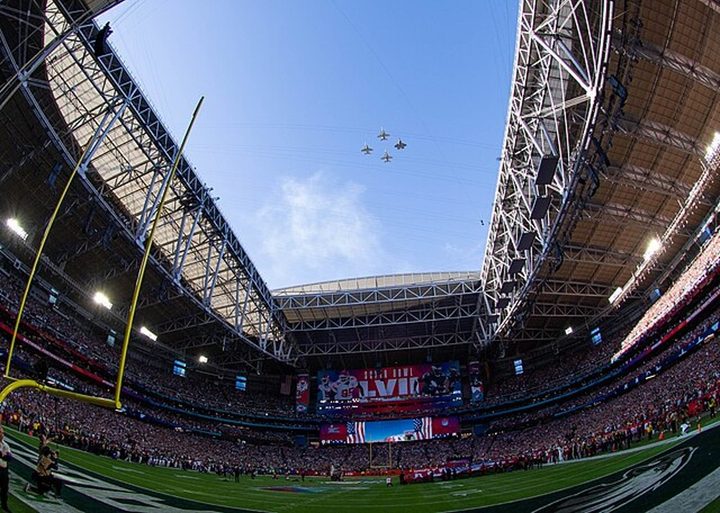 Jets fly over the Super Bowl.