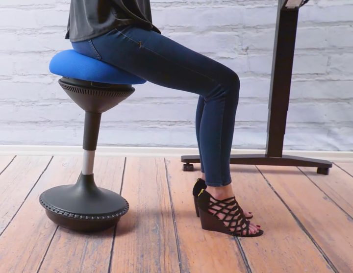 A person using the Motion Stool.