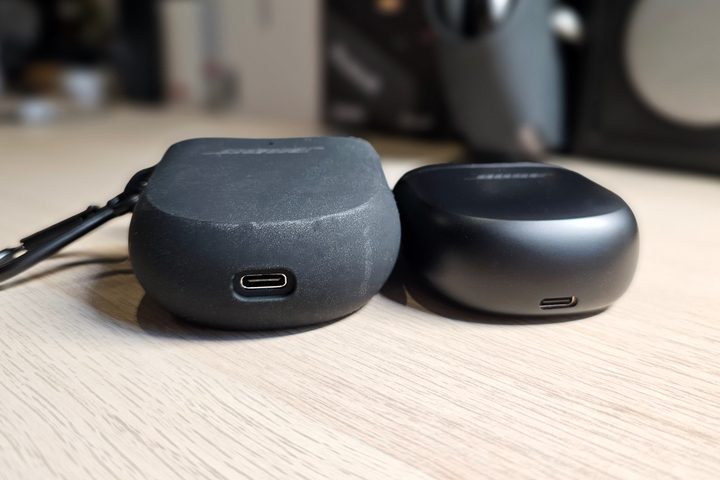 Bose Wireless Charging Case Cover beside the Bose QuietComfort Ultra Earbuds.