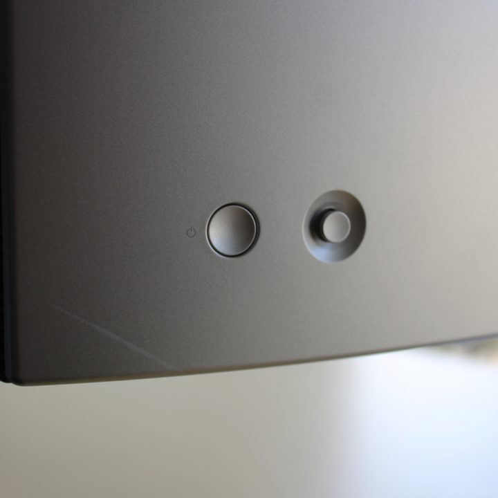 The joystick and power button on the back of the Dell UltraSharp 34.