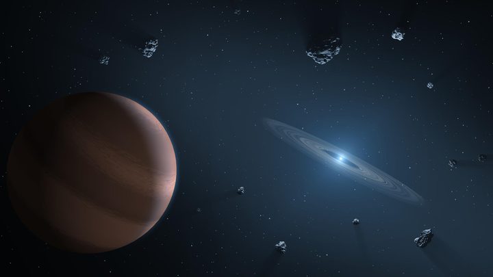 Illustration of a cloudy exoplanet and a disk of debris orbiting a white dwarf star.
