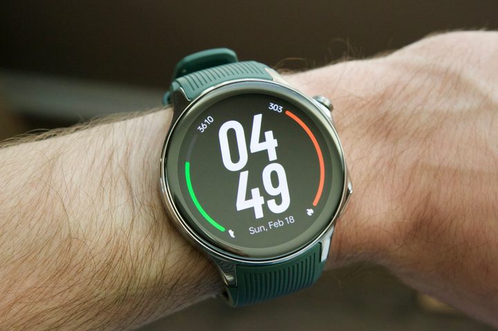 Someone wearing the OnePlus Watch 2 with a digital watch face.
