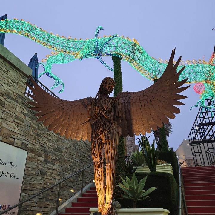 Winged statue lowlight taken on Samsung Galaxy S24 main camera.
