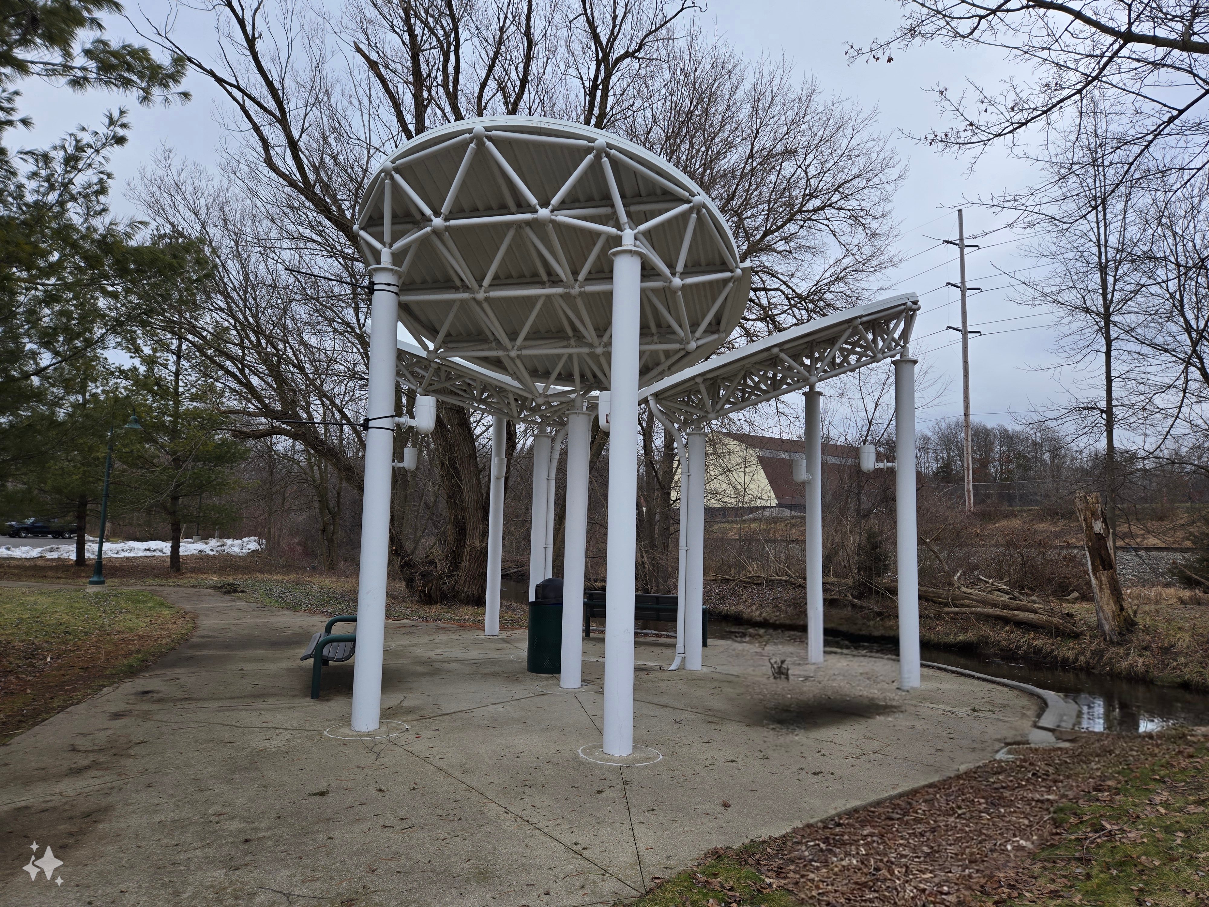 A photo of a structure in a small park.