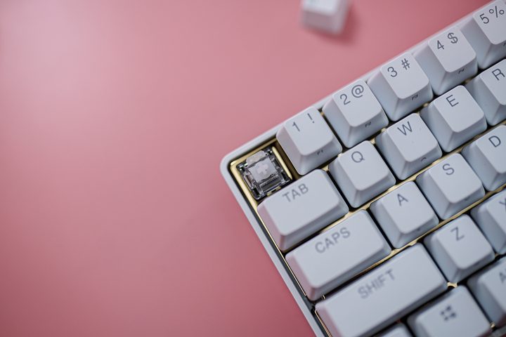 Switches on the Steelseries Apex Pro Mini White Gold keyboard.