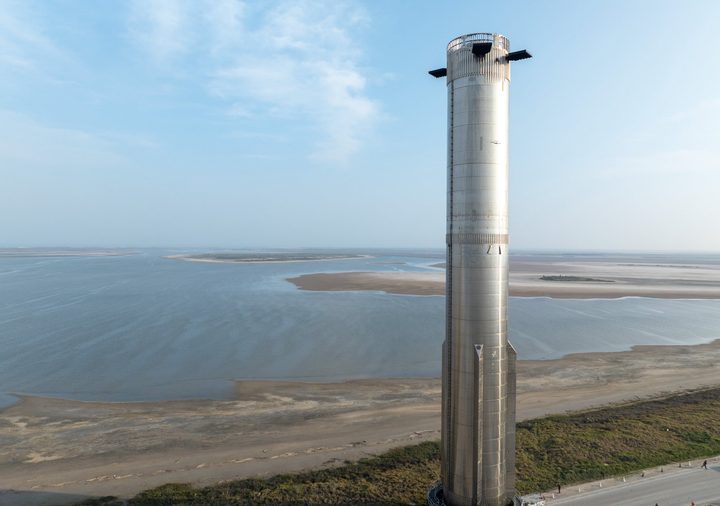 SpaceX's first-stage Super Heavy booster on its way to the launchpad at its Starbase site in Boca Chica, Texas.