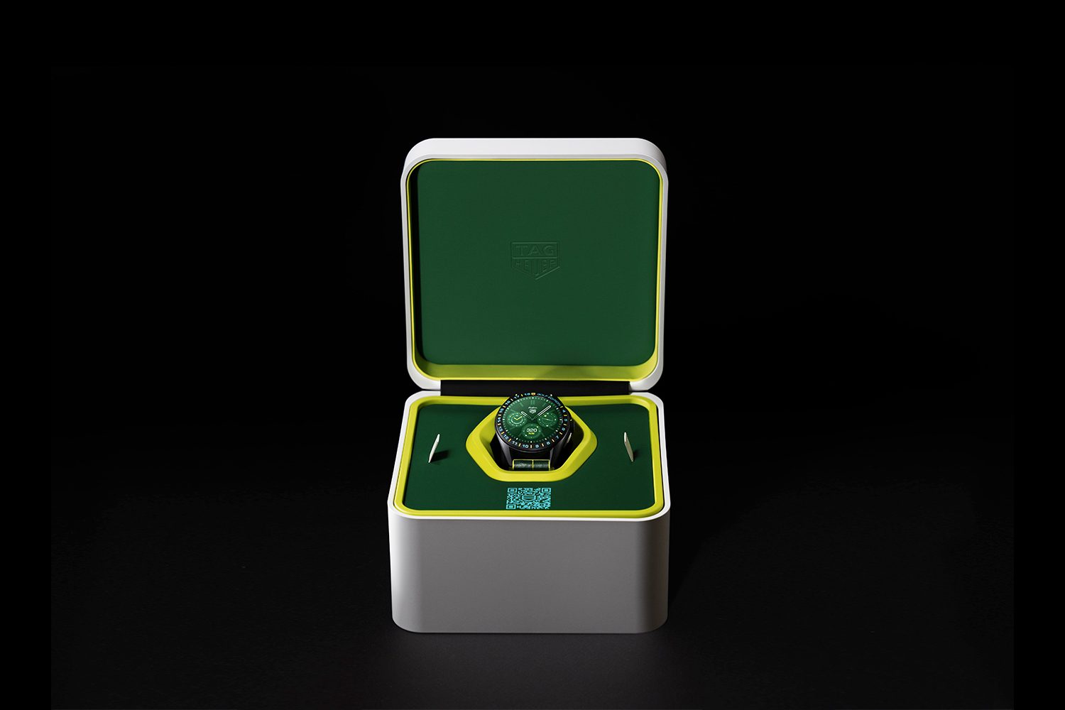 The Tag Heuer Connected Calibre E4 x Malbon Golf watch in its case.