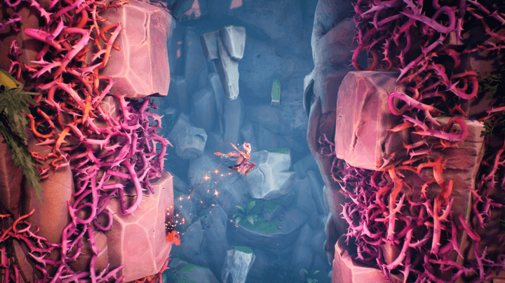 Zau wall jumps between red vines in Tales of Kenzera: Zau.