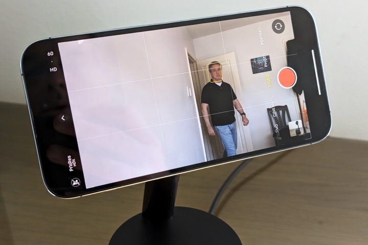 Belkin Stand Pro with iPhone 14 Pro showing person entering a room and being identified by DockKit.
