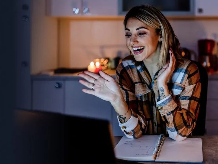 Woman on internet call using Frontier.