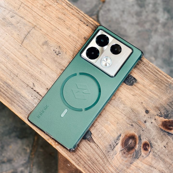 Infinix Note 40 Pro Plus with MagSafe green-colored compatible vegan leather case kept on a table.